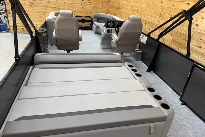 Slide: The Image of 2025 Premier Sunscape 220 RL boat interior with plush seating and modern design. - 11