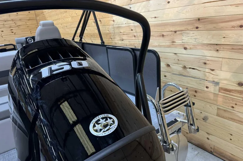 Slide: The Image of 2025 Premier Sunscape 220 RL boat with 150 HP engine and foldable ladder. - 3