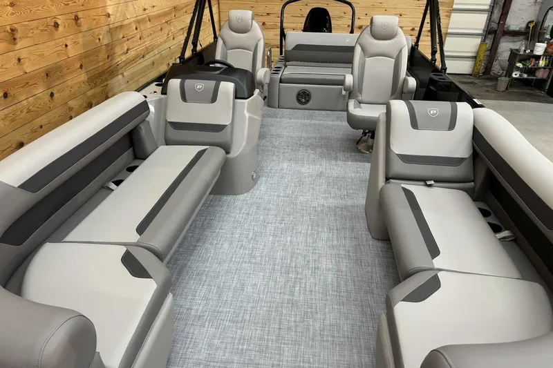 Slide: The Image of 2025 Premier Sunscape 220 RL boat interior with luxurious seating and modern design. - 6