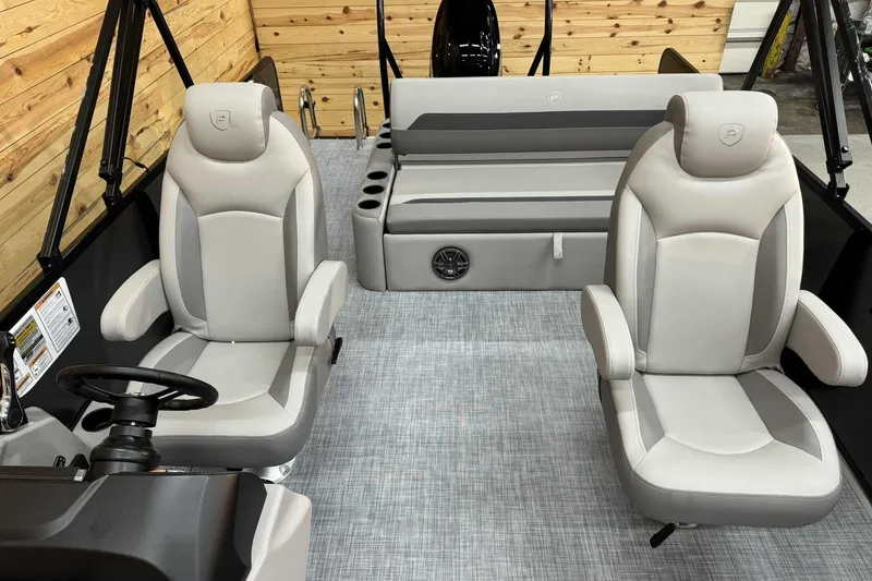 Slide: The Image of 2025 Premier Sunscape 220 RL boat interior with plush seating and modern design. - 7