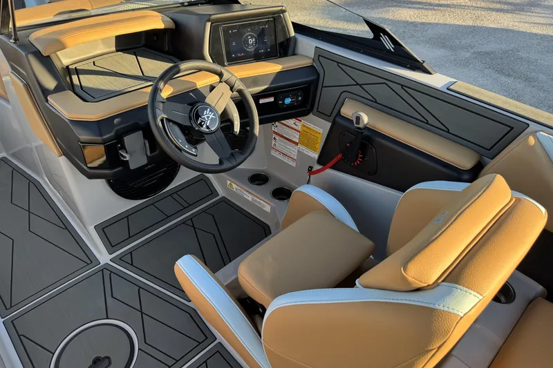 Slide: The Image of 2026 ATX Surf Boats 22 Type-S interior with modern dashboard and tan seating. - 6