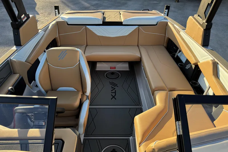 Slide: The Image of 2026 ATX Surf Boats 22 Type-S interior with tan seating and modern design. - 7