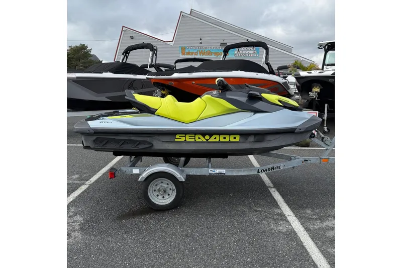 The Image of 2021 Sea-Doo GTI SE 130 jet ski on trailer, parked outdoors. - 13