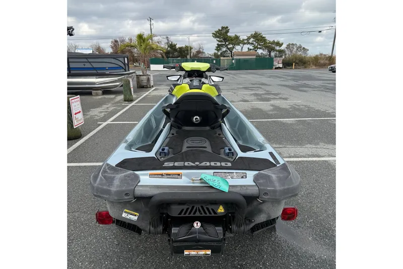 Slide: The Image of 2021 Sea-Doo GTI SE 130 jet ski parked in a lot, rear view. - 19