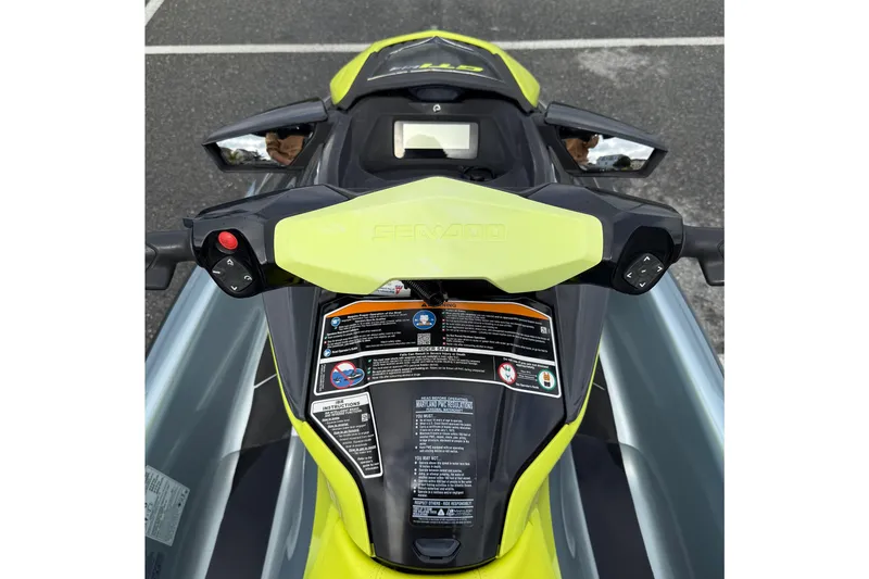 Slide: The Image of 2021 Sea-Doo GTI SE 130 dashboard and controls, featuring vibrant design and safety instructions. - 23