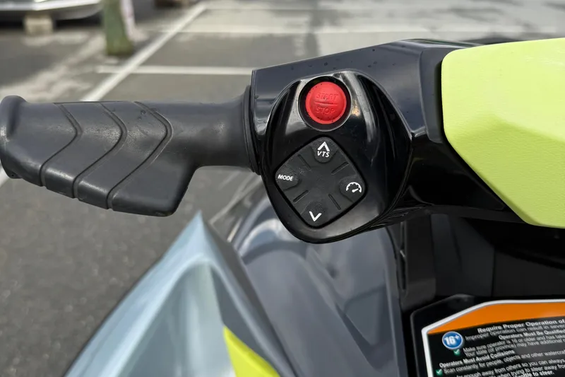 Slide: The Image of Close-up of 2021 Sea-Doo GTI SE 130 handlebar controls with start/stop button. - 25
