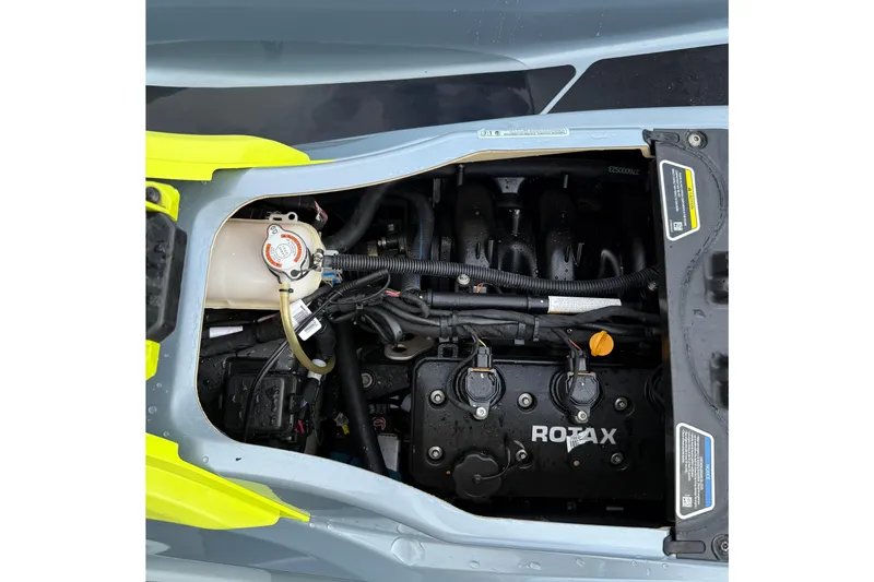 Slide: The Image of 2021 Sea-Doo GTI SE 130 engine compartment with Rotax engine components visible. - 27
