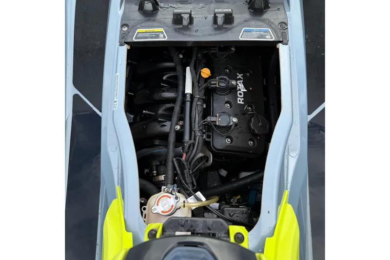 Slide: The Image of 2021 Sea-Doo GTI SE 130 engine compartment with visible Rotax engine components. - 28