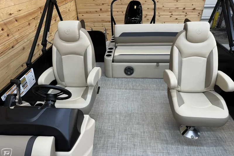 Slide: The Image of 2025 Premier Sunscape 220 RL boat interior with plush seating and modern design. - 7