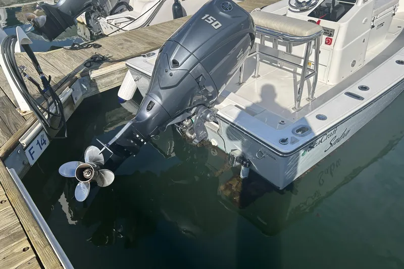 Slide: The Image of 2007 SeaCraft 20 Classic boat docked, featuring a 150 HP outboard motor. - 3