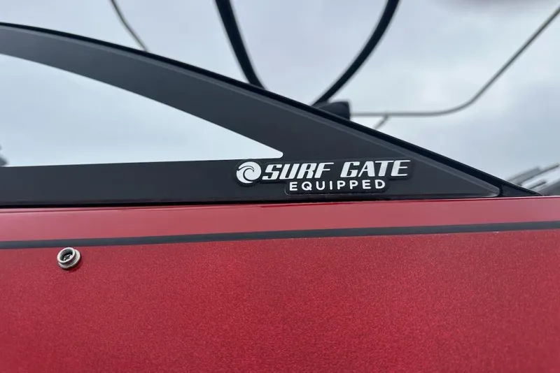 Slide: The Image of 2019 Malibu Wakesetter 23 LSV with Surf Gate Equipped feature, red exterior detail. - 11