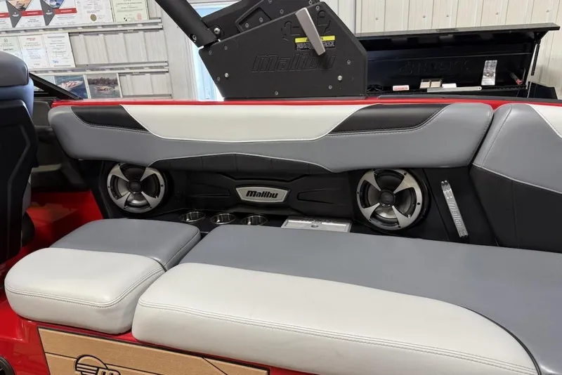 Slide: The Image of 2019 Malibu Wakesetter 23 LSV interior with speakers and cushioned seating. - 17