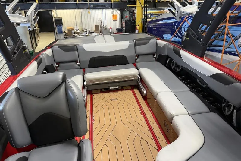 Slide: The Image of 2019 Malibu Wakesetter 23 LSV interior with luxurious seating and sleek design. - 22