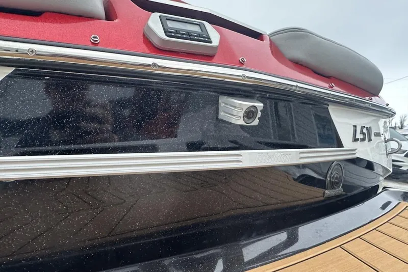 Slide: The Image of 2019 Malibu Wakesetter 23 LSV boat with sleek design and modern features. - 9