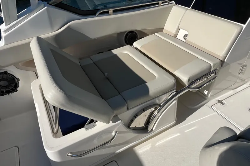 Slide: The Image of 2021 Boston Whaler 240 Vantage boat interior with adjustable seating and sleek design. - 18