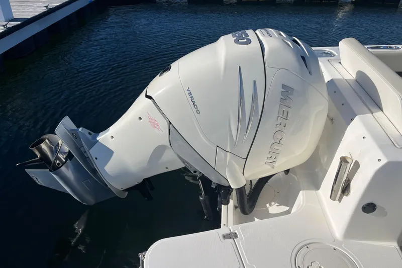 Slide: The Image of 2021 Boston Whaler 240 Vantage with Mercury Verado outboard engine on water. - 29