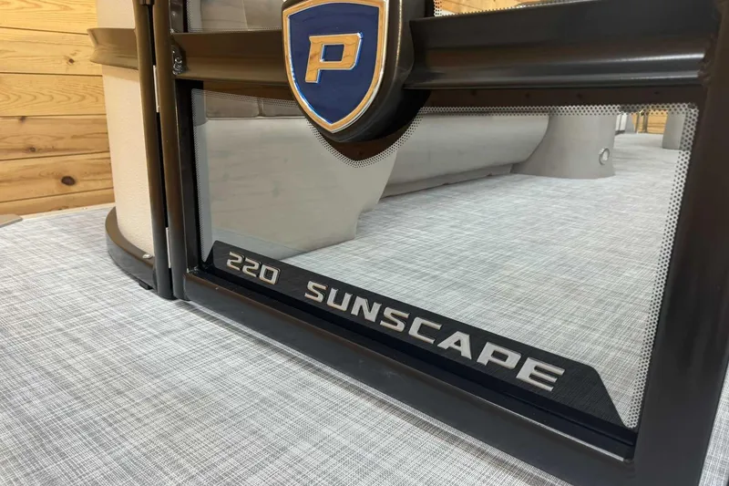 Slide: The Image of 2025 Premier Sunscape 220 RL boat detail with logo and model name. - 5