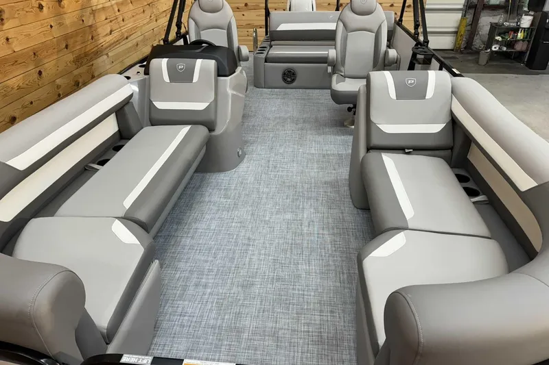 Slide: The Image of 2025 Premier Sunscape 220 RL boat interior with gray seating and modern design. - 6