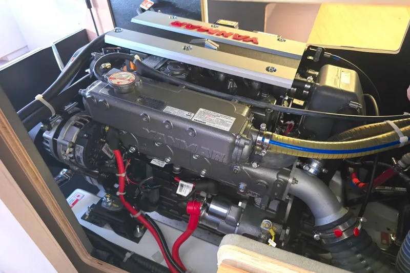 Slide: The Image of Engine compartment of a 2022 Beneteau Oceanis 40.1 sailboat, featuring a Yanmar engine. - 10