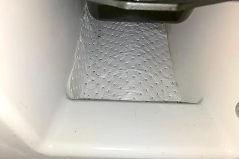 Slide: The Image of Interior detail of a 2022 Beneteau Oceanis 40.1 yacht, featuring a textured surface. - 13