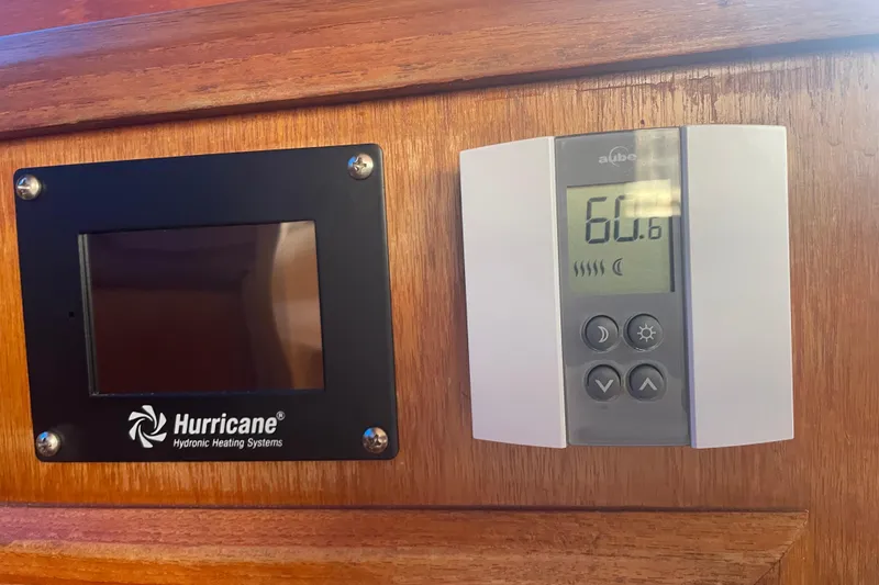 Slide: The Image of Thermostat and heating system controls on 1985 Ocean Alexander 38 Double Cabin yacht. - 14