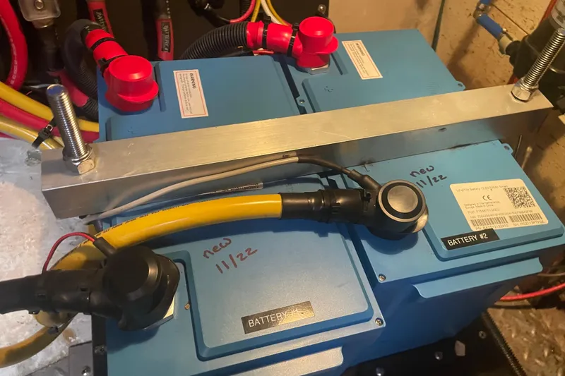 Slide: The Image of Battery setup in 1985 Ocean Alexander 38 Double Cabin yacht engine room. - 24