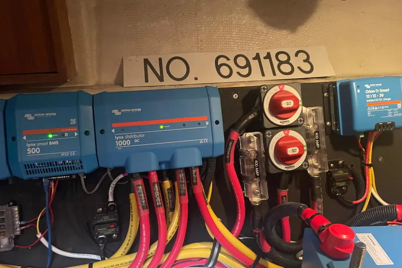 Slide: The Image of Electrical system of 1985 Ocean Alexander 38 Double Cabin with Victron Energy components. - 25