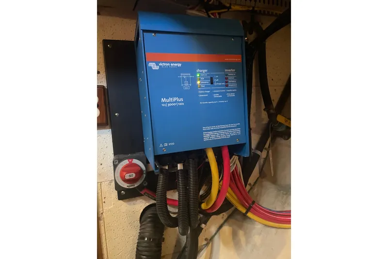 Slide: The Image of Victron Energy MultiPlus charger in 1985 Ocean Alexander 38 Double Cabin yacht. - 30