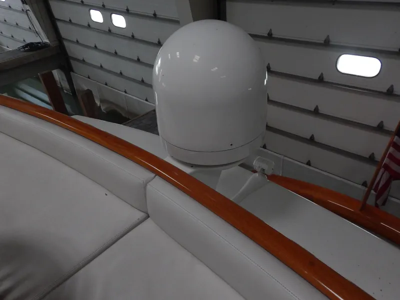 Slide: The Image of 1974 Pacemaker Cockpit Motoryacht interior with radar dome and wooden trim. - 32