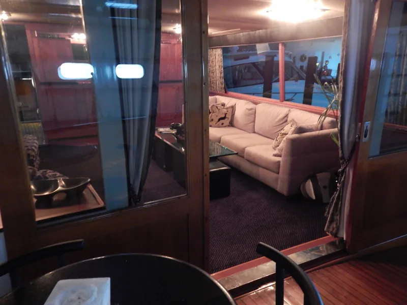 Slide: The Image of Interior of a 1974 Pacemaker Cockpit Motoryacht with cozy seating and elegant decor. - 34
