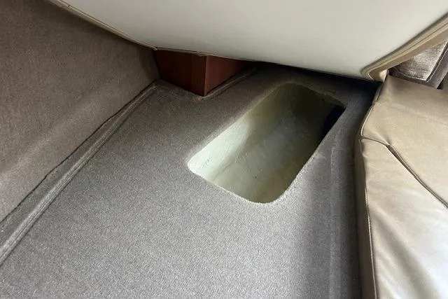 Slide: The Image of Interior view of 2017 Stingray 250 CR boat cabin with storage compartment. - 15