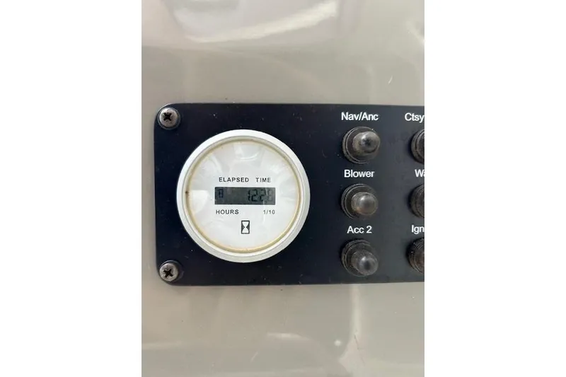 Slide: The Image of 2017 Stingray 250 CR boat dashboard with elapsed time gauge reading 122.9 hours. - 8