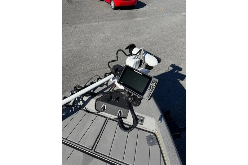 Slide: The Image of 2023 Vexus AVX1980CC boat with mounted electronic navigation system on deck. - 14