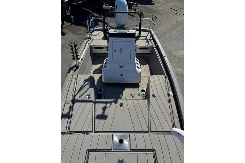 Slide: The Image of 2023 Vexus AVX1980CC boat deck with modern design and fishing equipment. - 6