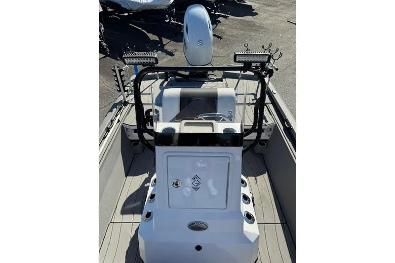 Slide: The Image of 2023 Vexus AVX1980CC boat interior with console and steering wheel. - 7