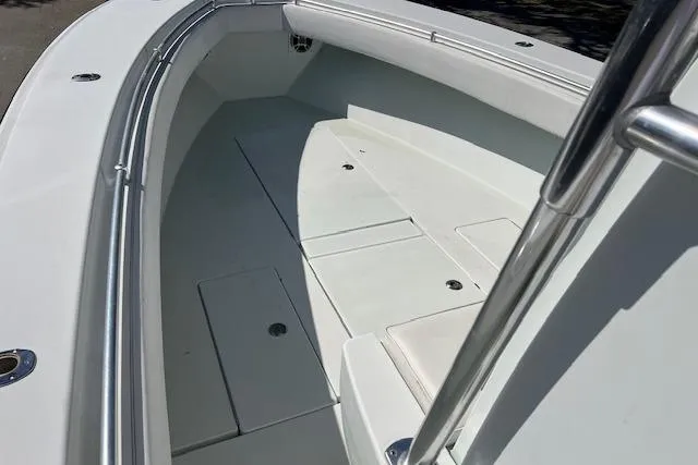 Slide: The Image of 2008 Contender 31 Fisharound boat interior, featuring spacious seating and sleek design. - 12