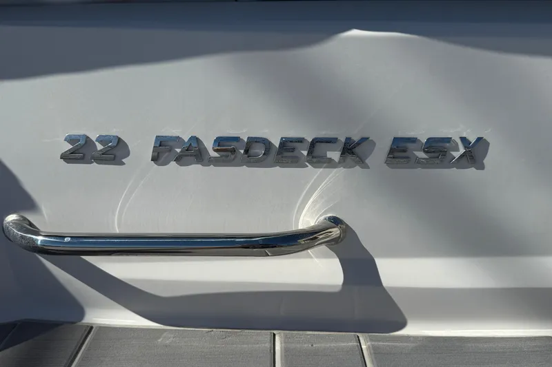 Slide: The Image of 2018 Regal 22 FasDeck ESX boat emblem with chrome handle. - 16