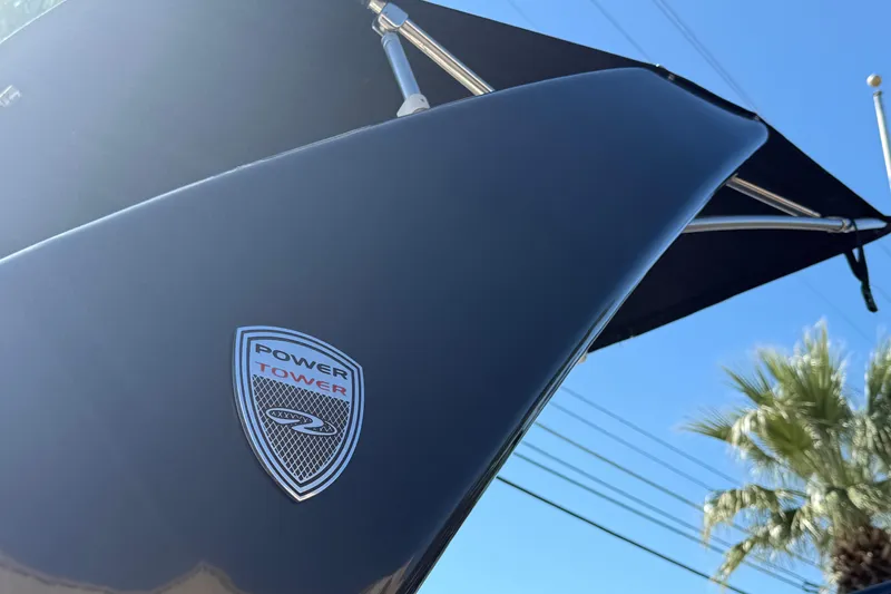 Slide: The Image of 2018 Regal 22 FasDeck Power Tower against blue sky and palm trees. - 17