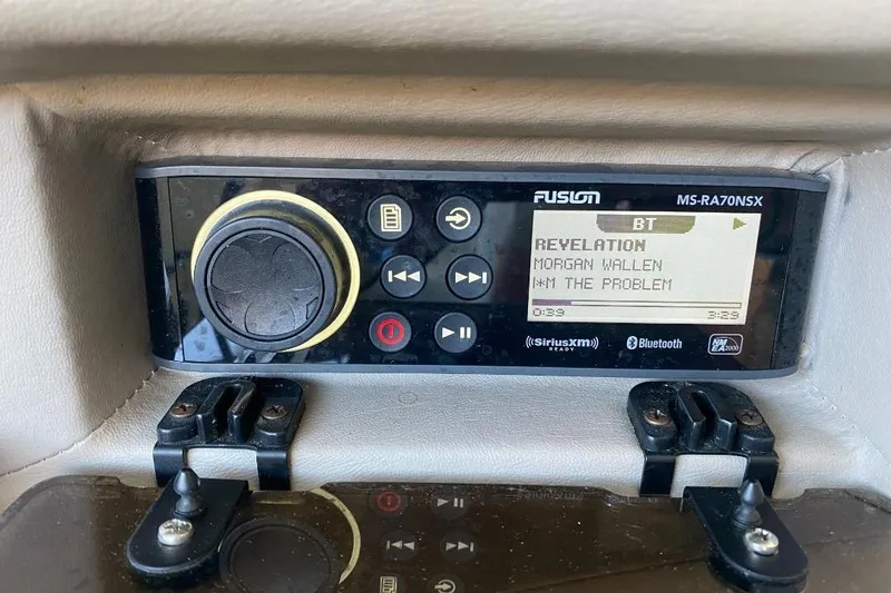 Slide: The Image of Fusion MS-RA70NSX stereo system in 2002 Cobalt 282, displaying song by Morgan Wallen. - 13