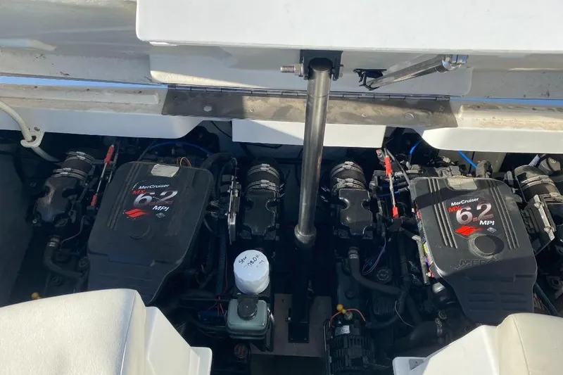 Slide: The Image of Twin MerCruiser 6.2 MPI engines in a 2002 Cobalt 282 boat. - 2