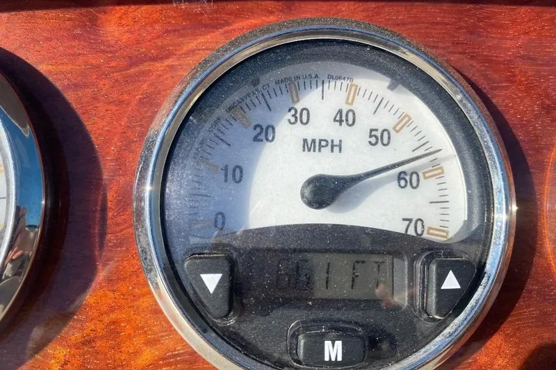 Slide: The Image of Speedometer of a 2002 Cobalt 282 boat, showing 61 MPH. - 22