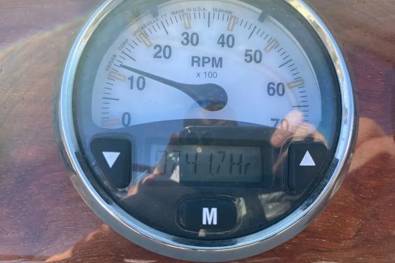 Slide: The Image of Close-up of a 2002 Cobalt 282 RPM gauge displaying 17 hours. - 23