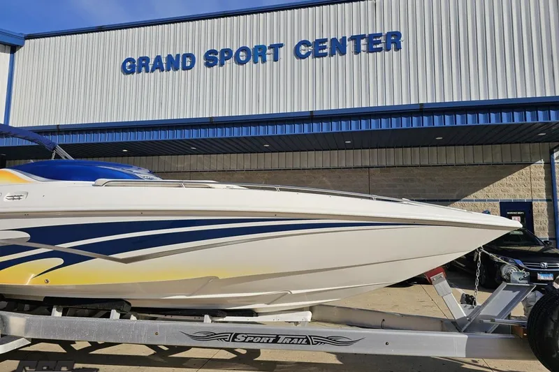 Slide: The Image of 2010 Sunsation 288 MID-CABIN boat on trailer at Grand Sport Center. - 16