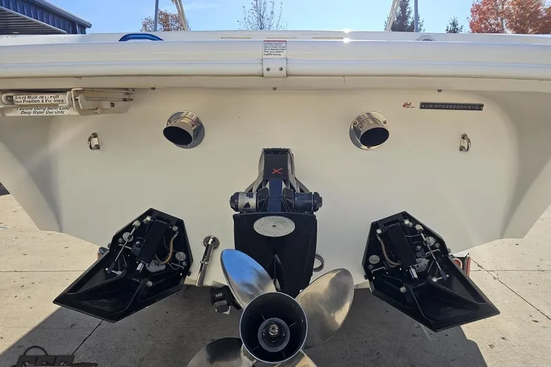 Slide: The Image of Rear view of 2010 Sunsation 288 MID-CABIN boat with dual propellers and exhaust ports. - 32