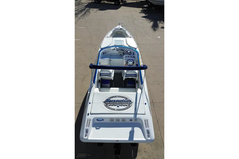 Slide: The Image of 2010 Sunsation 288 MID-CABIN OPEN BOW boat, aerial view, docked on concrete surface. - 36