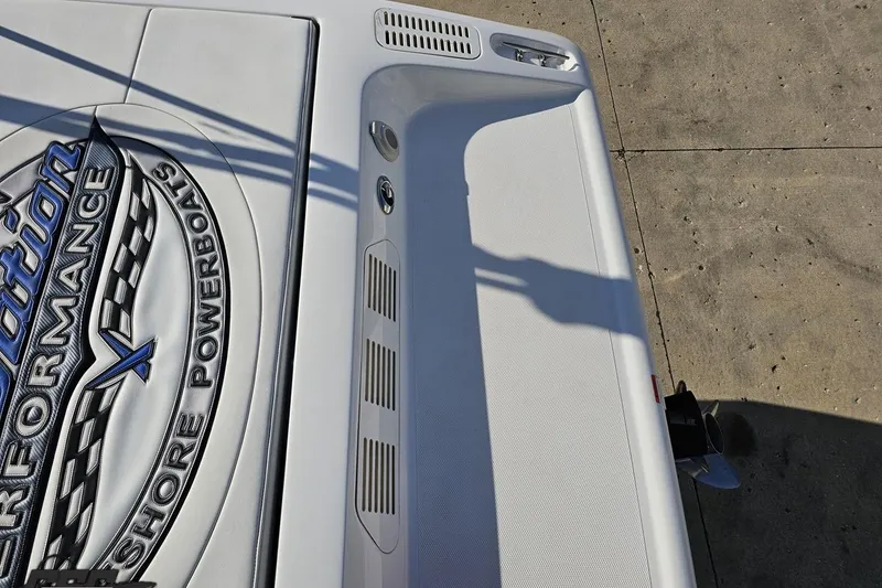 Slide: The Image of 2010 Sunsation 288 MID-CABIN boat deck with performance branding and shadow. - 44