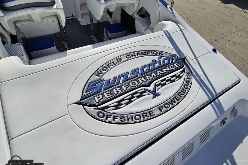 Slide: The Image of 2010 Sunsation 288 MID-CABIN boat with "World Champion Offshore Powerboats" logo on deck. - 45