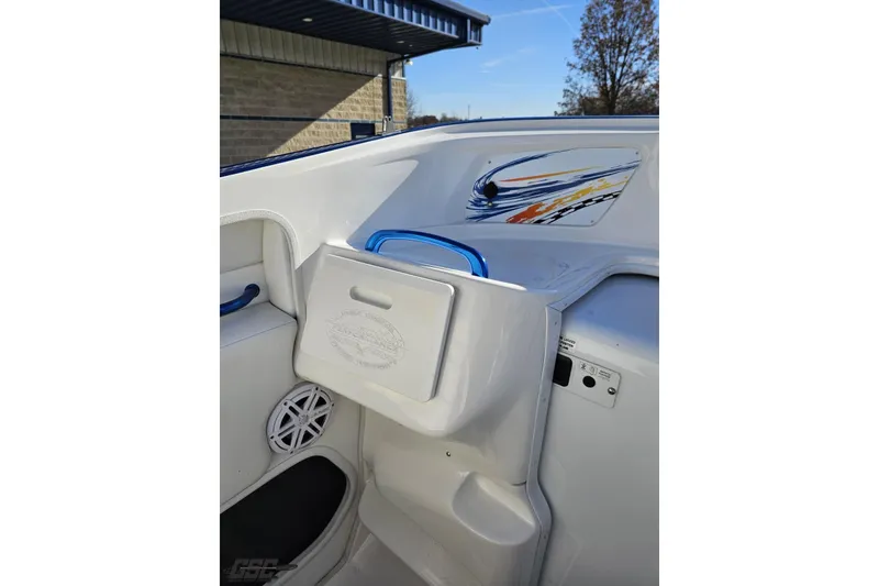 Slide: The Image of 2010 Sunsation 288 MID-CABIN boat interior with storage compartment and speaker. - 60