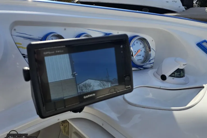 Slide: The Image of Dashboard of 2010 Sunsation 288 MID-CABIN boat with Garmin GPS and gauges. - 66
