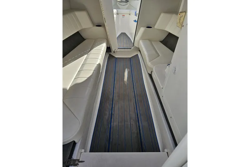 Slide: The Image of 2010 Sunsation 288 MID-CABIN interior with sleek seating and modern flooring. - 74